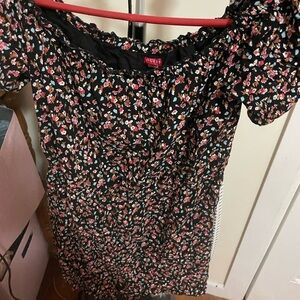 Romper above the knee. Off the shoulder some what fitting. Runs a little small